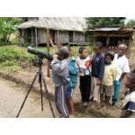 Kids using Borderland Tours scope. Photo by Rick Taylor. Copyright Borderland Tours. All rights reserved.