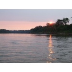 Sunset on the Río Tambopata. Photo by Joe and Marcia Pugh. All rights reserved.