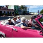 Pink Converrtible ride in Old Havana. Photo by Rick Taylor. Copyright Borderland Tours. All rights reserved.