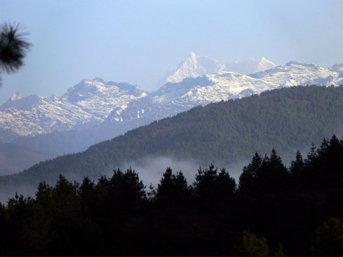 View from ura la pass on on the trans-bhutan highway. Photo by Rick Taylor. Copyright Borderland Tours. All rights reserved.