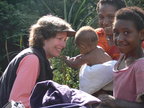 Barbara wih the kids on the hike to see the lesser bird-of-paradise. Photo by Rick Taylor. Copyright Borderland Tours. All rights reserved.
